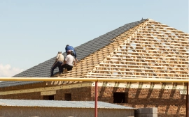 Roof repair work on an Alaska home